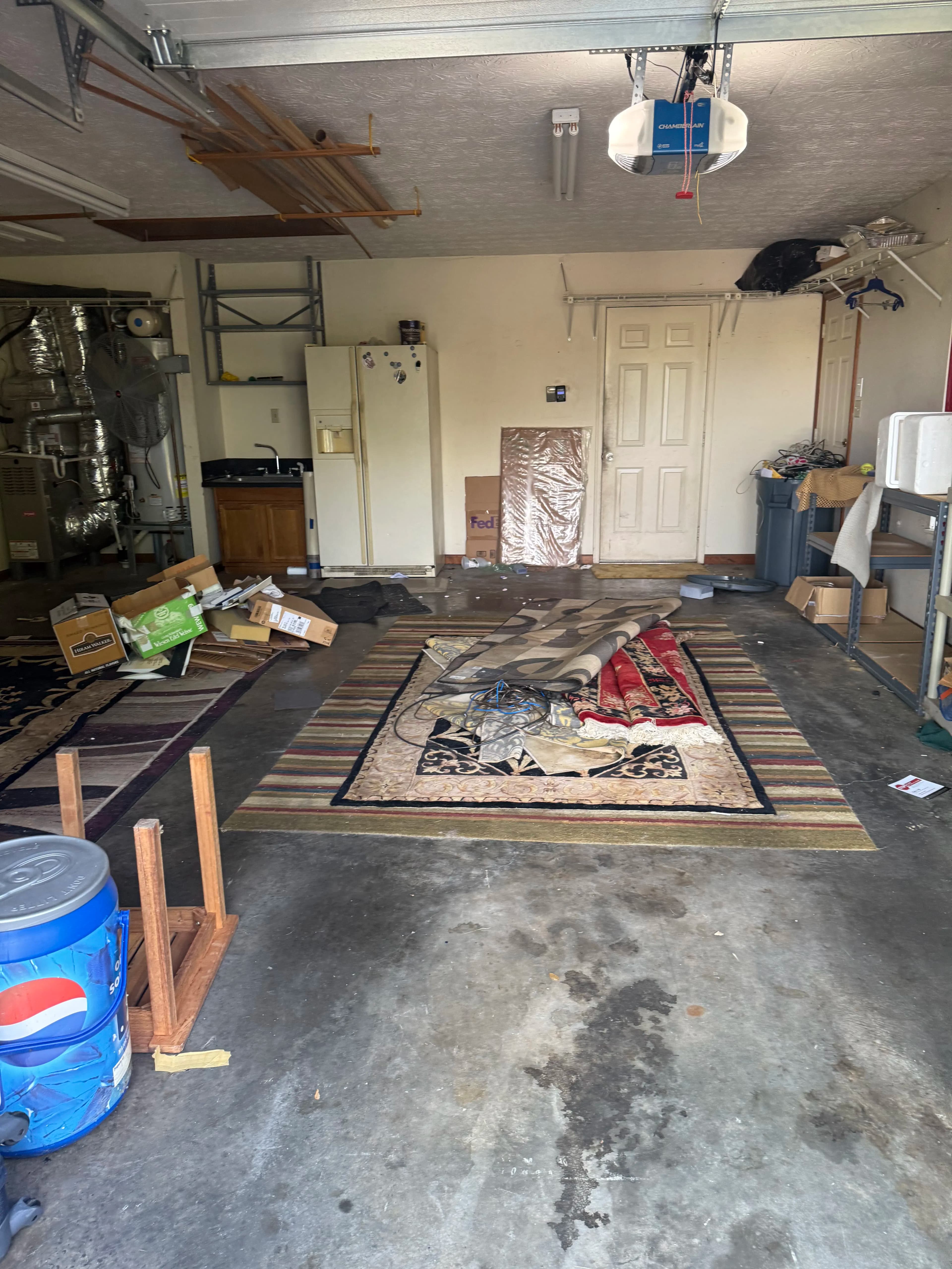 Project Packed Garage Cleared Out Floor to Door image