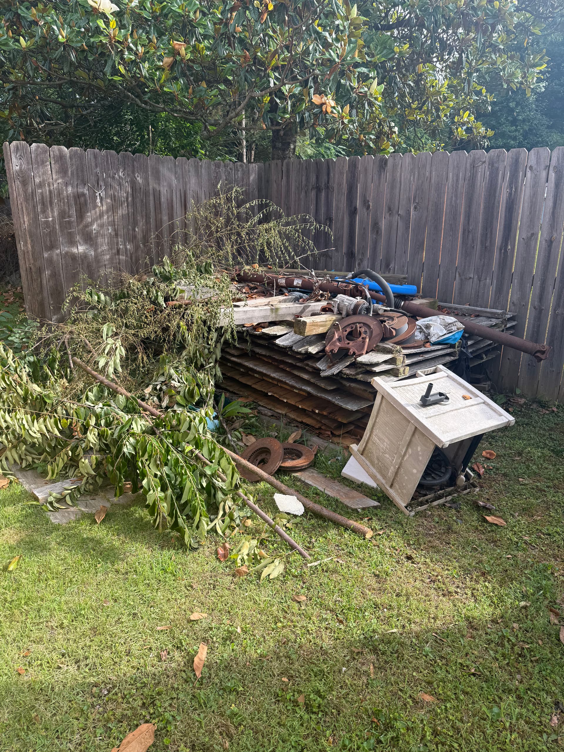 Backyard Junk Pileup Cleared and Ready for Use image